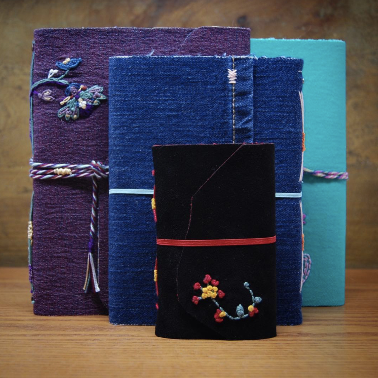 four denim journals handmade books