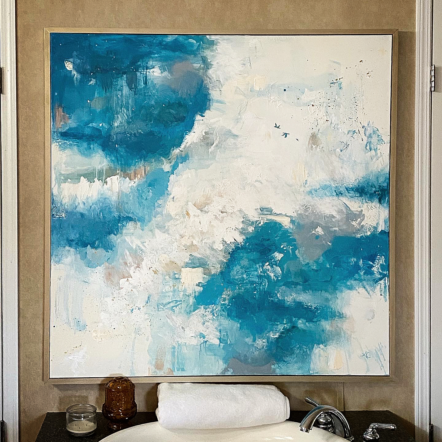 Abstract painting with 3 tiny birds flying through vast sky. Blues, whites, golds, frame, 4'x4'